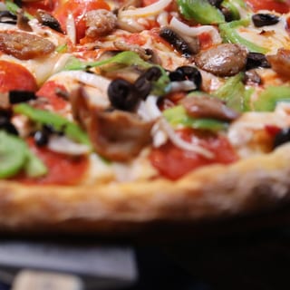 Supreme Pizza Slice